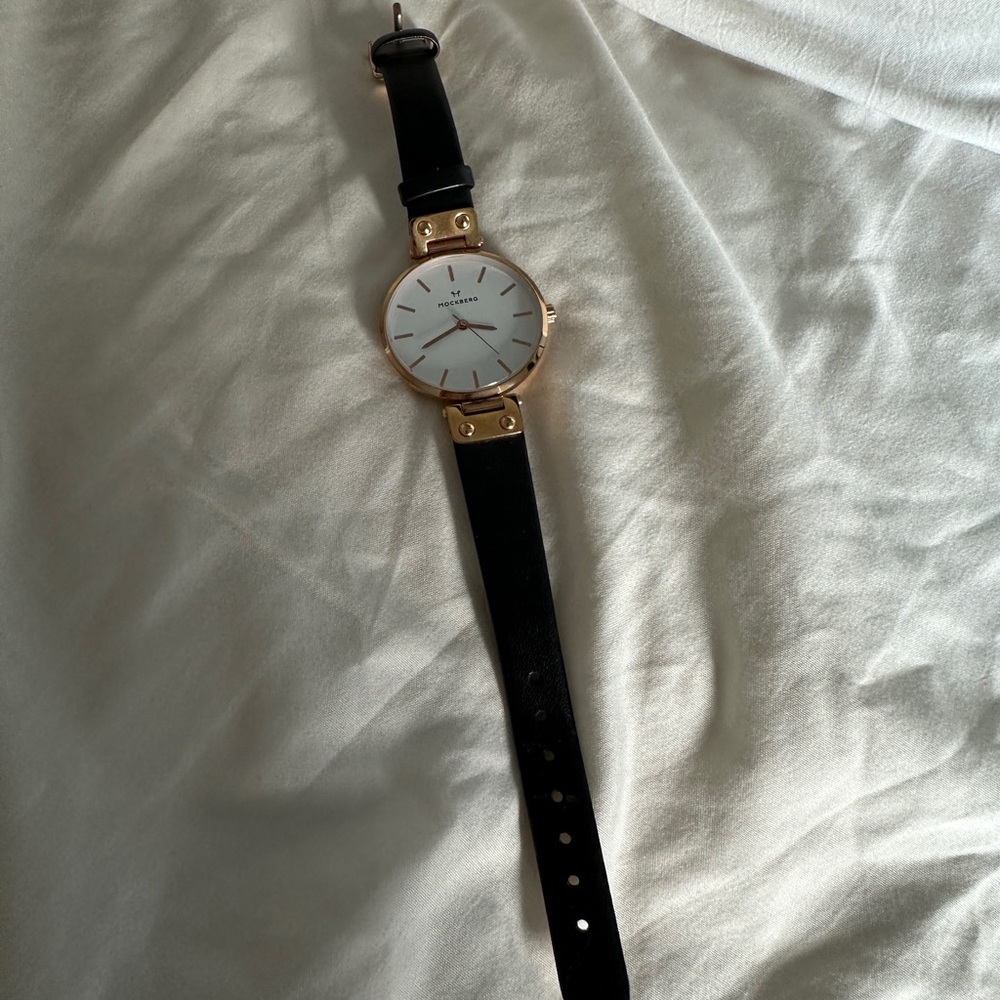 Daniel Wellington Black and Gold Watch